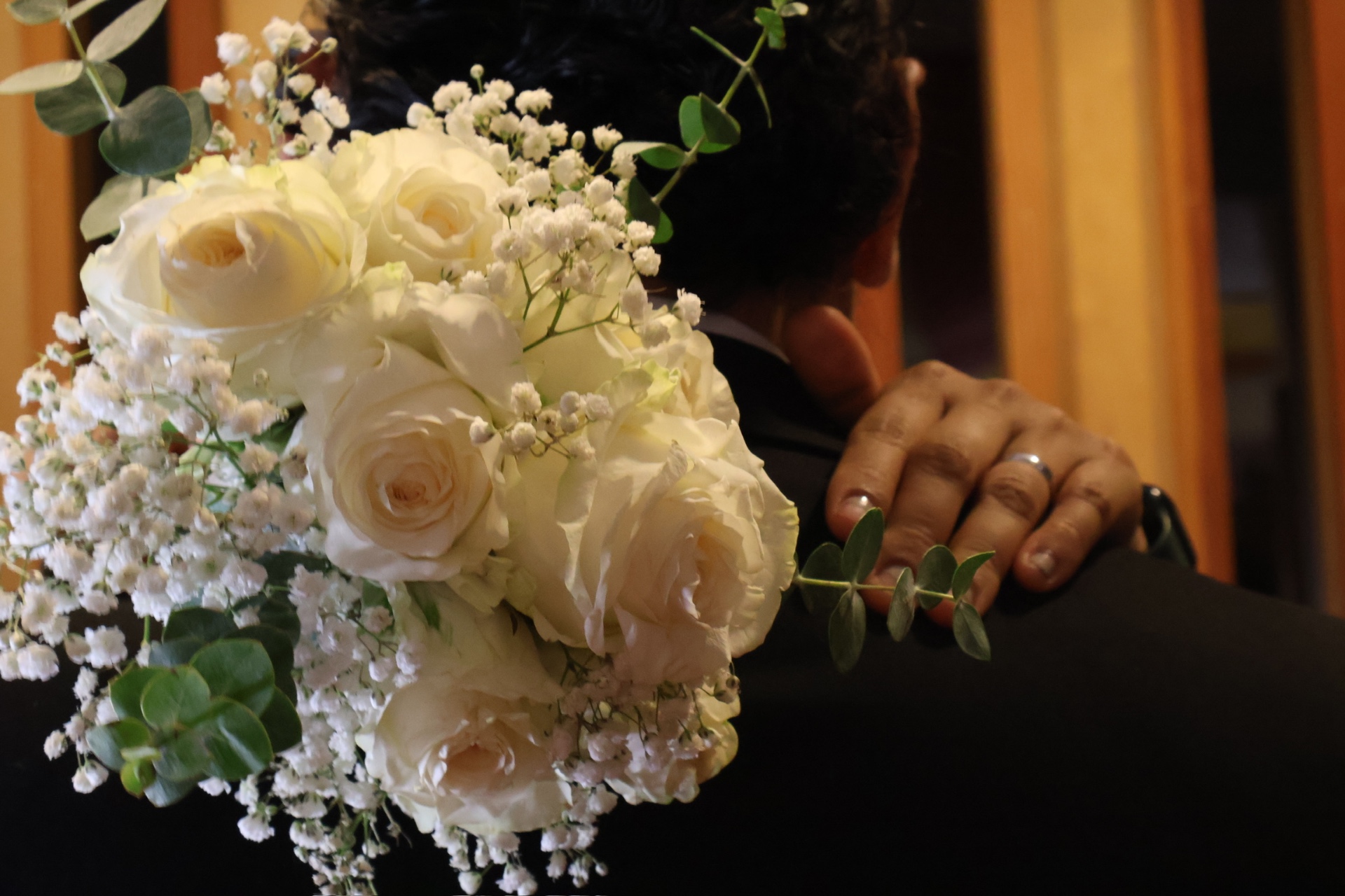 Wedding bouquet embrace